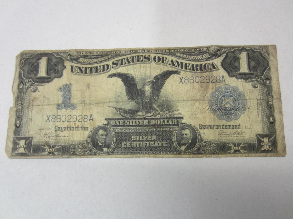 1899 Series One Dollar Silver Certificate: Coin grades have been based on Red Book Guidelines for grading. We are not a certified coin or currency grading service.