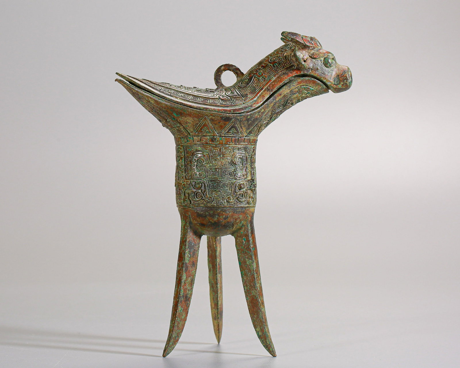 A Chinese Bronze Wine Vessel Zhou Dyn.: A Chinese Bronze Wine Vessel Zhou Dyn. 669g; H 20cm; W 14cm