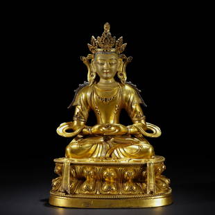 A Chinese Bronze-gilt Seated Bodhisattva: A Chinese Bronze-gilt Seated Bodhisattva. L 21cm; H 32cm; 6.38kg