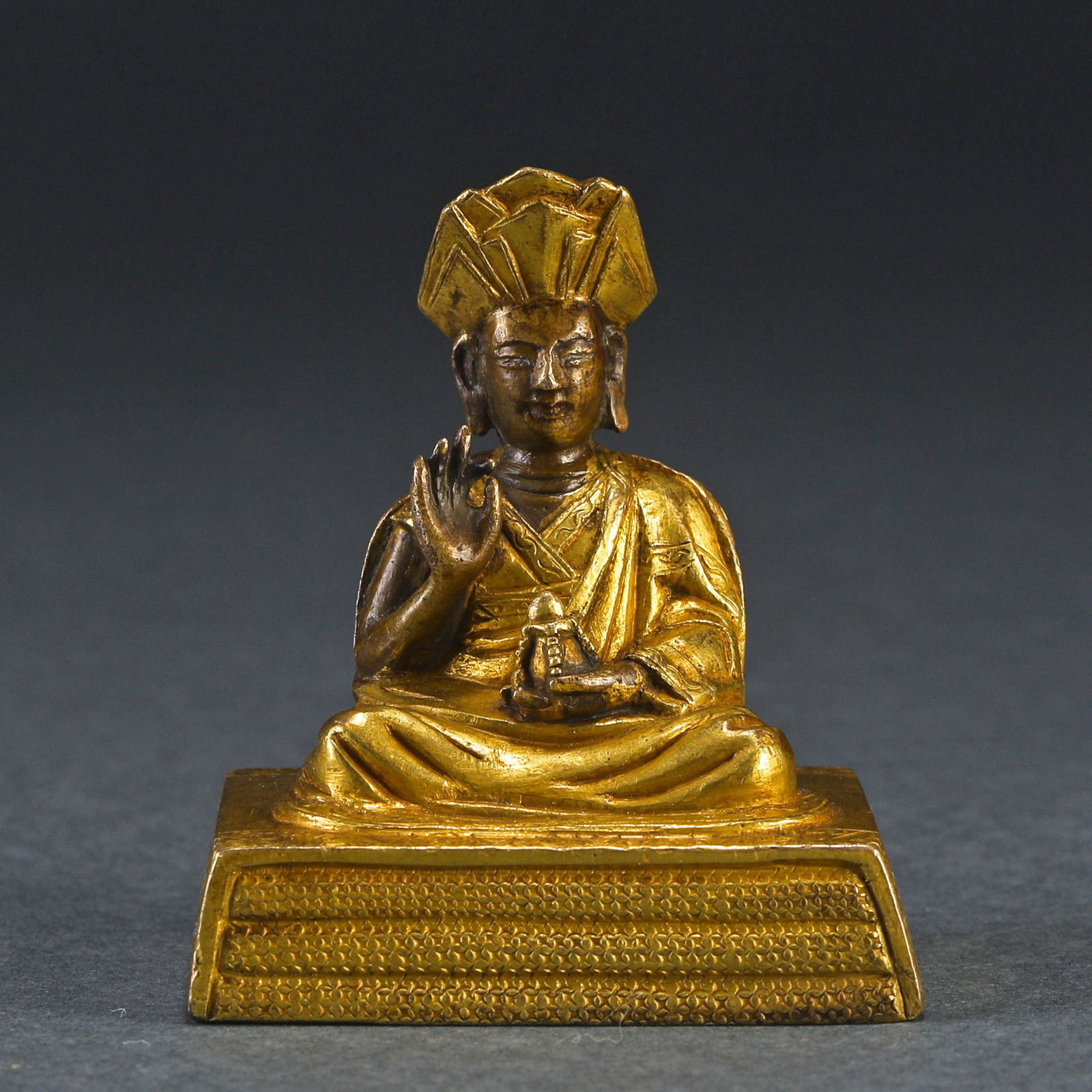 A Tibetan Gilt Bronze Figure of Master (0001) on May 28, 2022