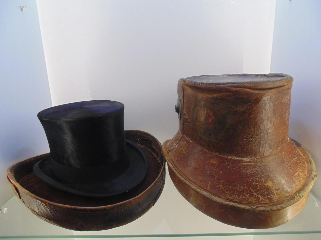 Leather hat box with top hat circa 1830/1840: Leather hat box with top hat circa 1830/1840