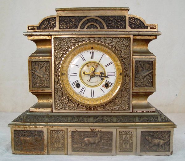 NEW HAVEN CAST IRON MANTEL CLOCK WITH SCENES OF STA