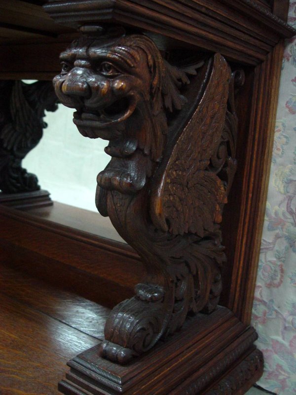 HEAVILY CARVED QUARTER SAWN OAK CABINET WITH GARGO - 2