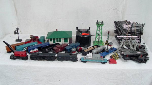 LIONEL TRAIN SET. 13 CARS, TRAIN STATION, COAL LOA: LIONEL TRAIN SET. 13 CARS, TRAIN STATION, COAL LOADER, K W TRANSFORMER, #395 FLOODLIGHT TOWER, TENDER, ENGINE #671 WITH LOTS OF TRACK & OTHER ACCESSORIES