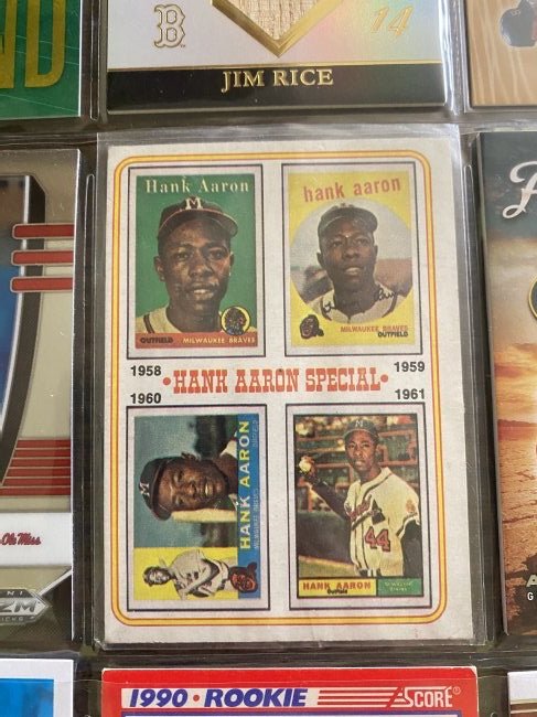 Hank Aaron and long box full of sport cards: Hank Aaron and long box full of sport cards. This comes from a state sale and each box was divided in different lots. You are