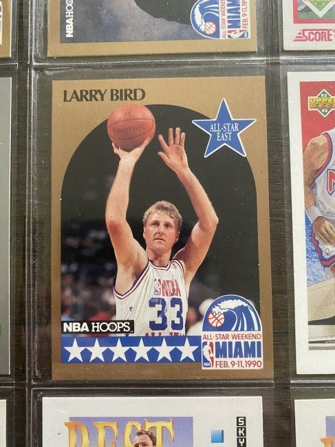 Larry Bird and box full of sport cards: Larry Bird and box full of sport cards. This comes from a state sale and each box was divided in different lots. You