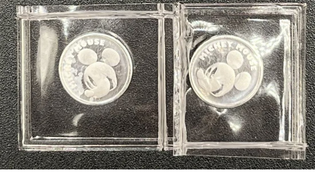 Disney Silver Coins: (2) two Disney Silver Coins Mickey Mouse , they both together weights : 4.1 grams .