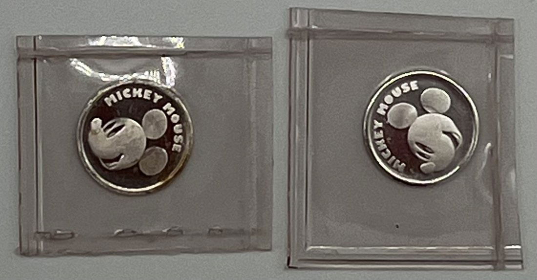 Mickey Mouse Silver Coins: Mickey Mouse Silver Coins , each coin is 1/20 silver Oz , both coins together is 2/20 Oz
