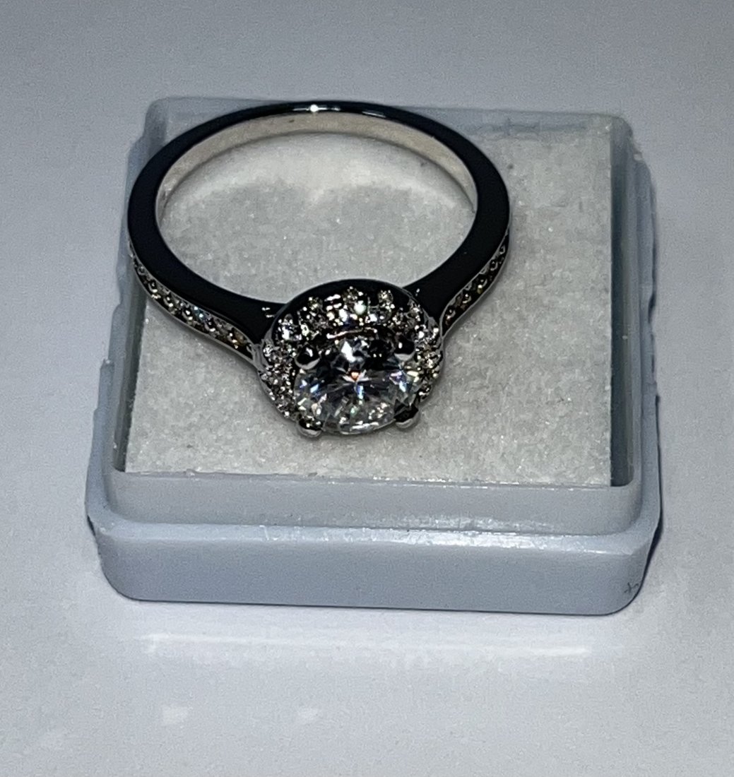Ring Moissanite: Moissanite Women Silver Ring size: 7. It does pass for Diamond test with Diamond selector II