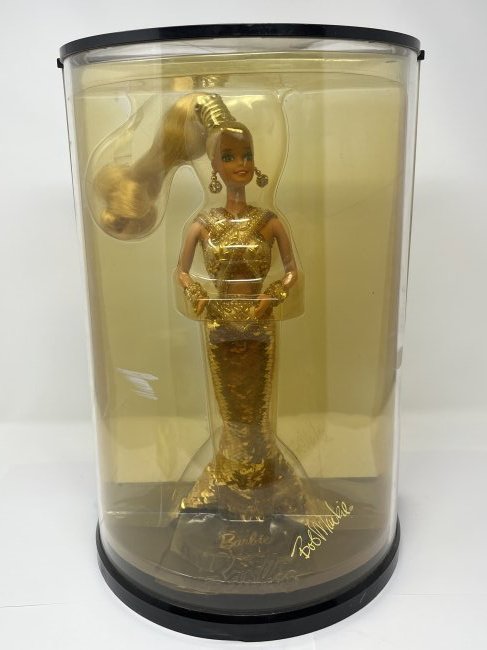 BARBIE BOB MACKIE LIMITED EDITION SIGNED: BARBIE IN A CASE, BOB MACKIE SIGNATURE SHOWING ON PICTURES. SIZE: ABOUT 14 INCHES TALL