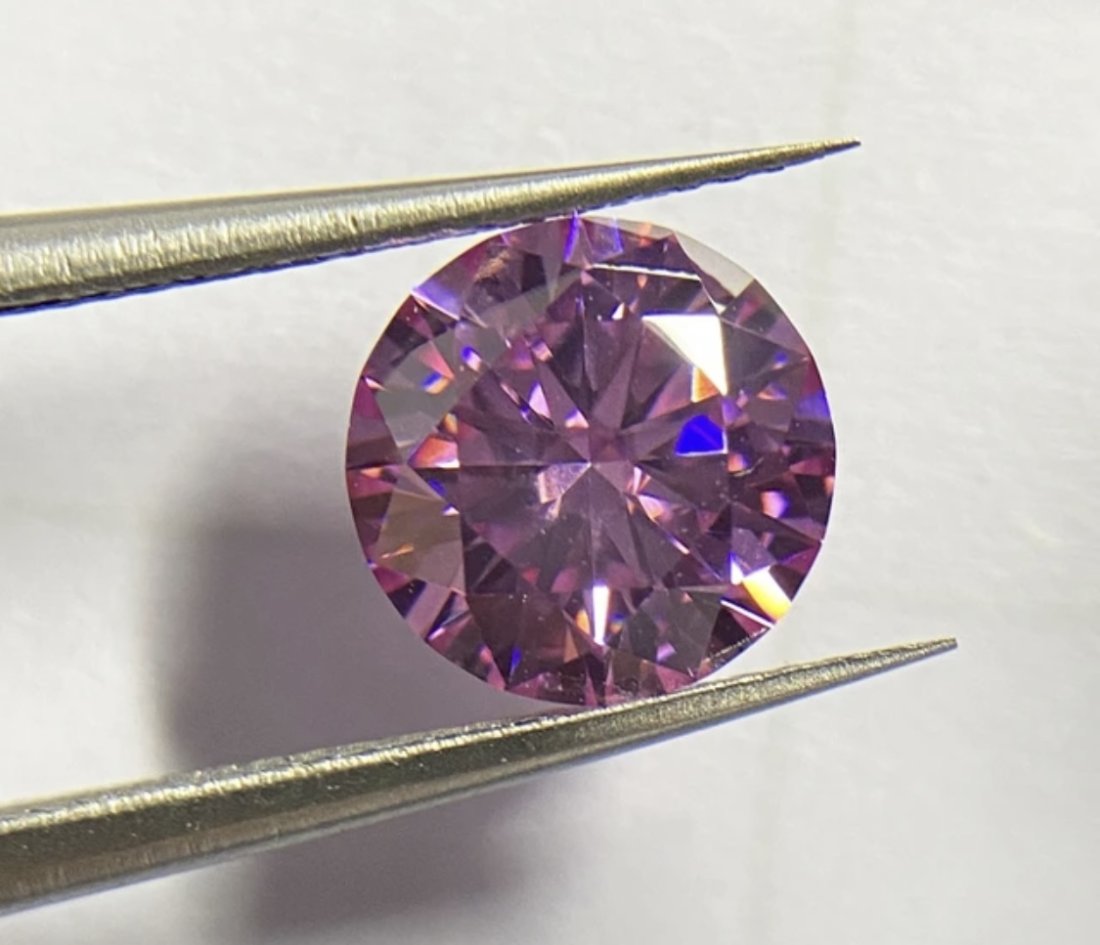 Pink Moissanite VVS1: Pink Moissanite VVS1 Stone , It comes with GRA Certificate. The stones passes for Diamond using Diamond Selector II tester. 3 Carats