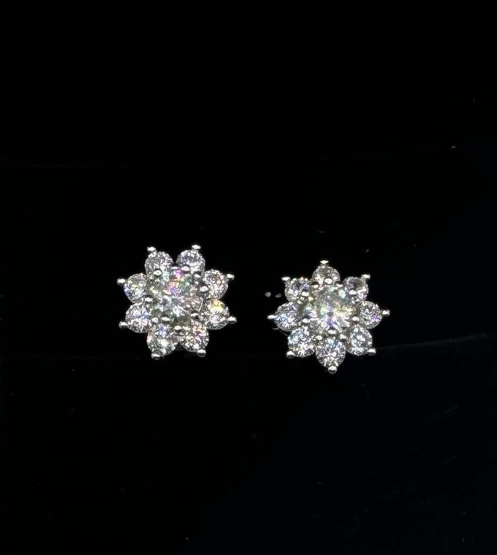 Fancy VVS Earrings: 18k White Gold Played on sterling silver Moissanite VVS1, Color Grade D , Weight: 0.5 carats each total of 1 carat pair . It comes with GRA Certificate. stone passes for Diamond Using a Diamond Tester