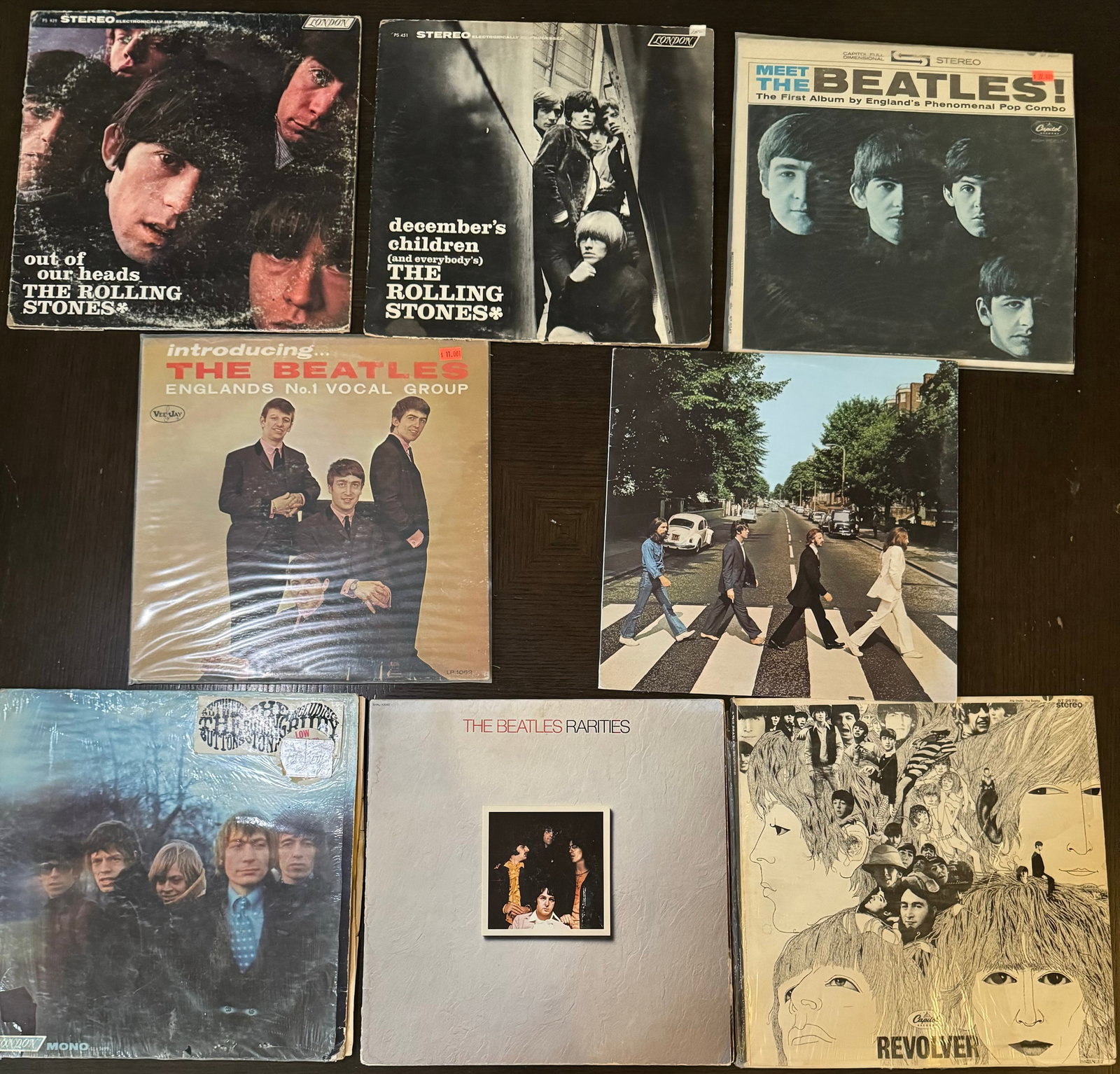 The Beatles Records Collection: (8) The Beatles Records.Meet The Beatles , The Beatles Englands, Beatles Abbey Road , the Beatles revolver, The Beatles parities and 3 Rolling Stones records