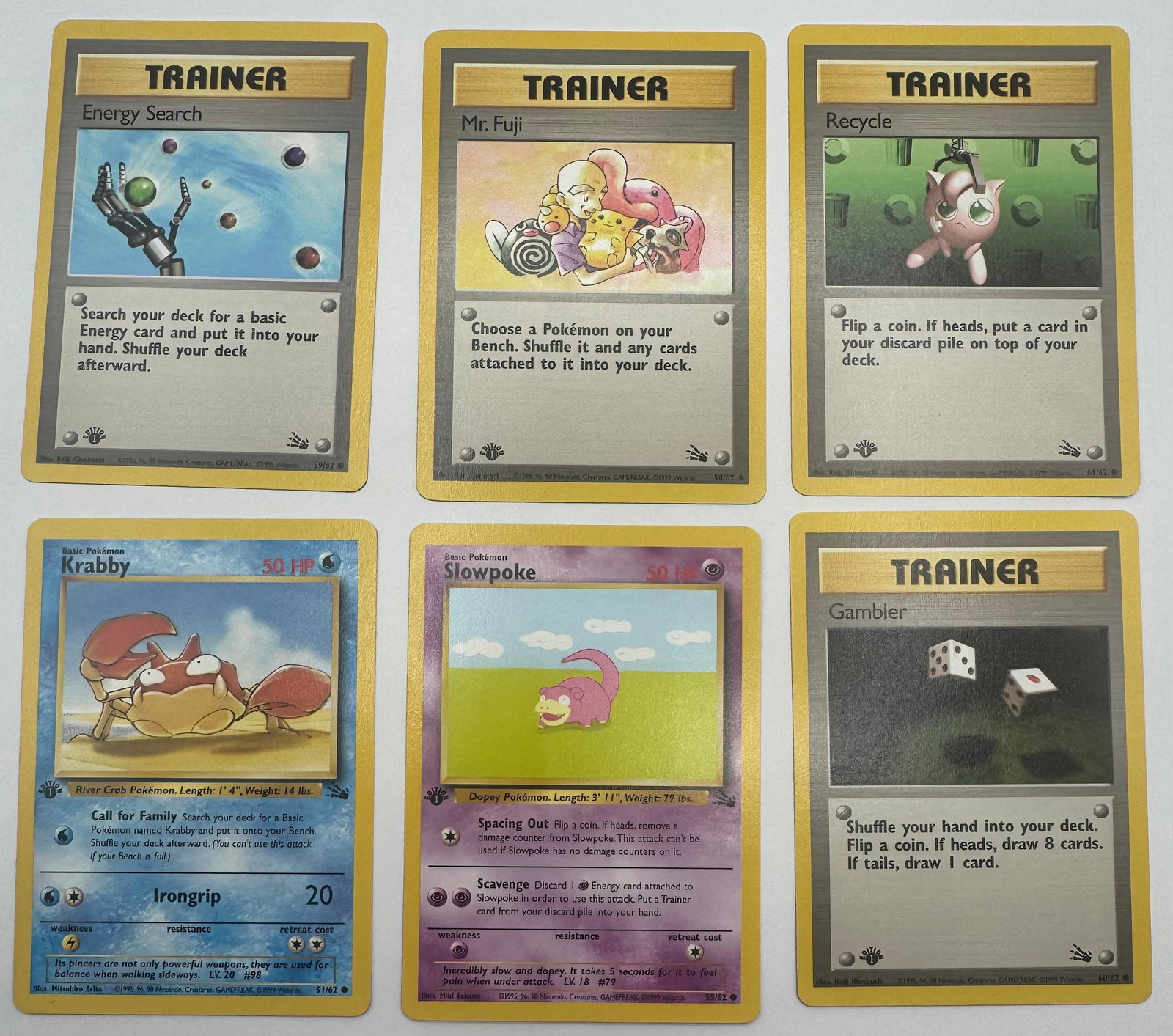 First Edition Trainer Pokemon Cards: 1999 First Edition Trainer Pokemon Cards and 1st edition Krabby And Slowpoke Trading cards