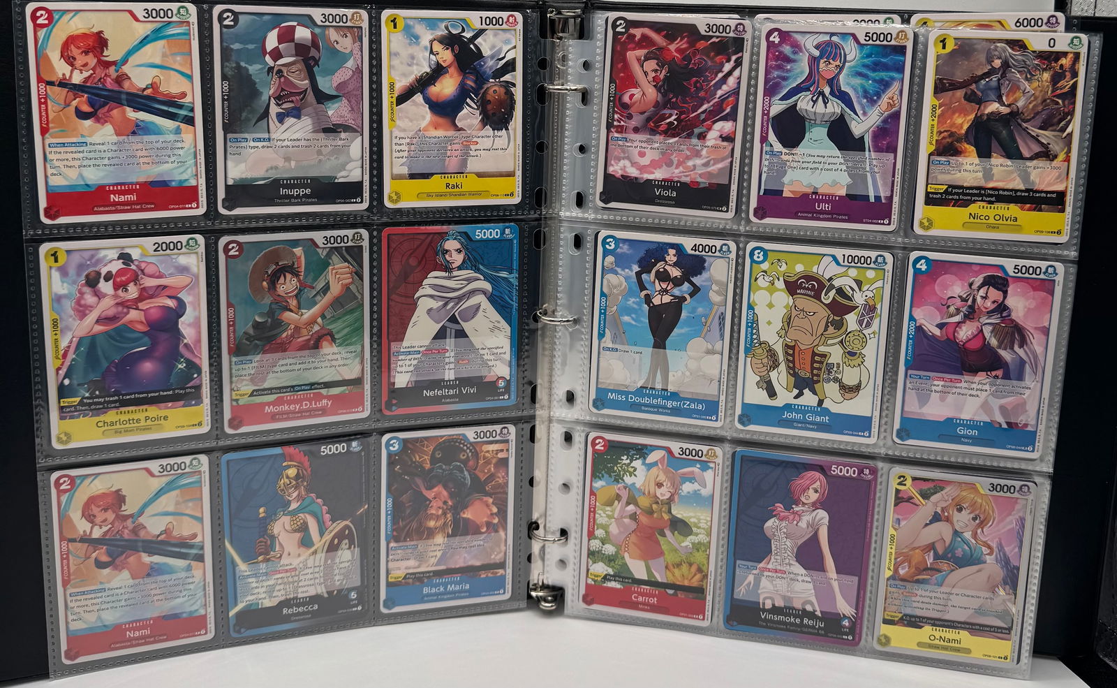 One Piece Trading Cards Binder: One Piece Trading Cards Binder. Monkey D Luffy, Nami, John Giant, Gion, Vinsmoke, Rebecca, Monet And many more characters. Binder has over 250 cards.