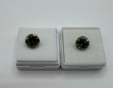 (2) Two Yellow Green VVS Stones