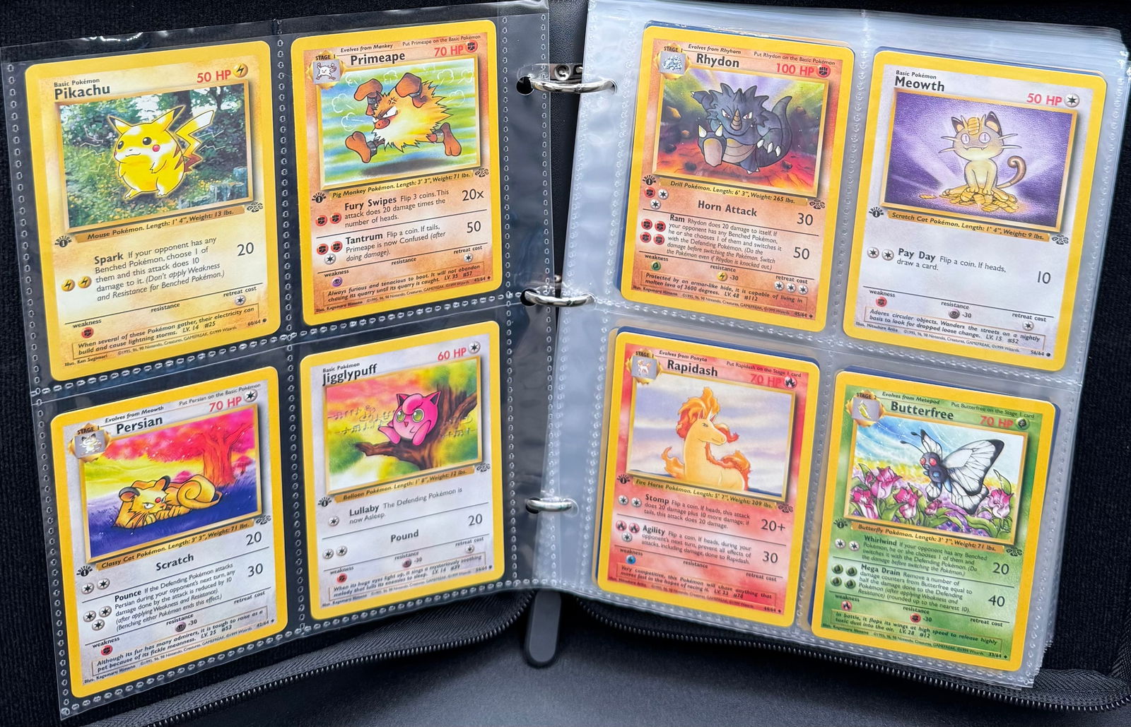 1999 Jungle Set 1st Edition Binder: 1999 Jungle Set 1st Edition Binder. Total of 32 1999 Pokemon first edition cards 