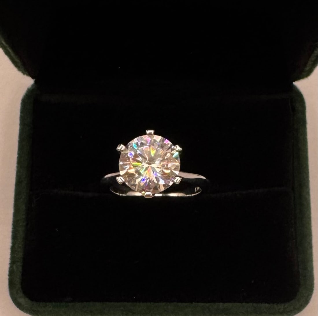 Moissanite VVS Ring: 5 Carats Stone Moissanite Ring Mounted in Sterling with White Gold Overlay, with Certificate Of Authenticity & Jewelry Case. Size: 8 