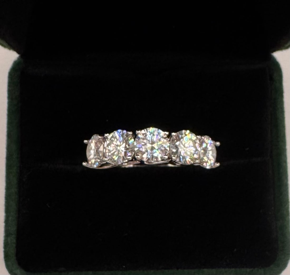 5 Carats Moissanite VVS Ring: 5 Carats Stone Moissanite Ring Mounted in Sterling with White Gold Overlay, with Certificate Of Authenticity & Jewelry Case. Size: 8 