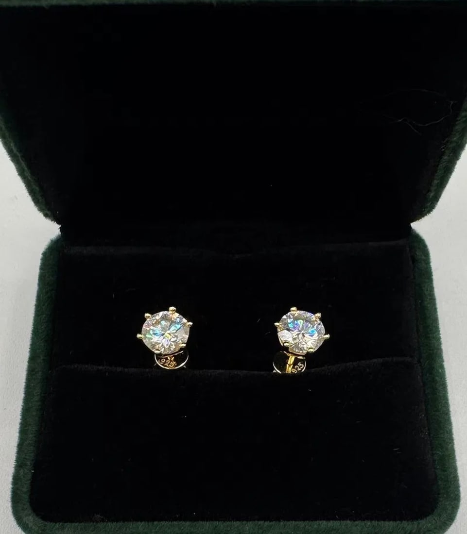 Pair Of Moissanite Earrings: 1 Carats Color D Moissanite Each Earring Total Of 2 Carats Mounted in Sterling with Yellow Gold Overlay, with Certificate Of Authenticity 