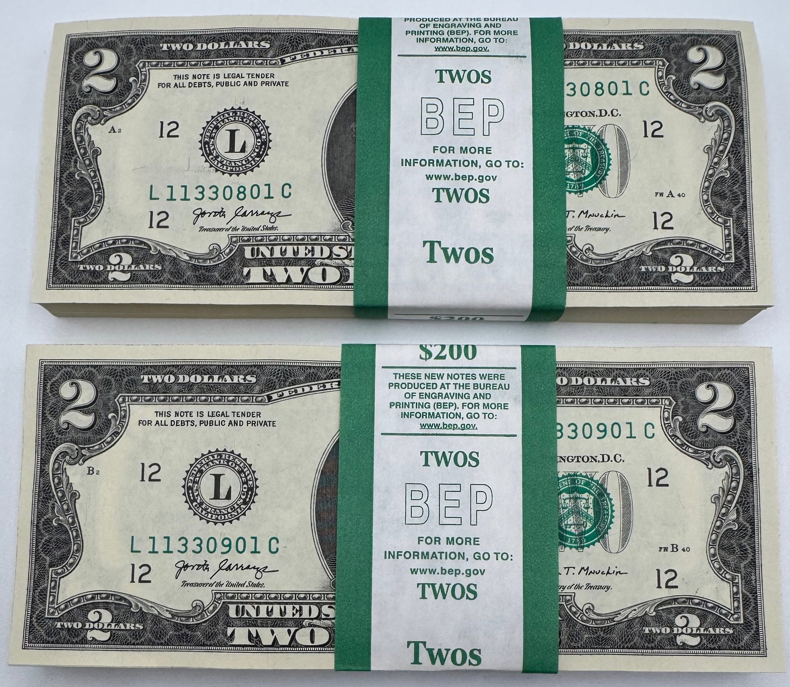 Two Bundles Of Two Hundred Dollar Bills: Two Bundles Of Two Hundred Dollar Bills . Face Value: $400. Each bundle has consecutive serial # 