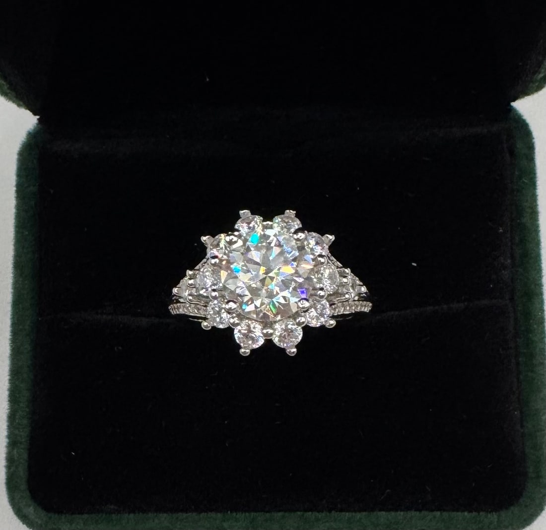 3 Carats VVS Ring: 18k White Gold Plated On sterling Silver Moissanite VVS1 Stone Ring Color: D Stone Size: 3 carats. 
