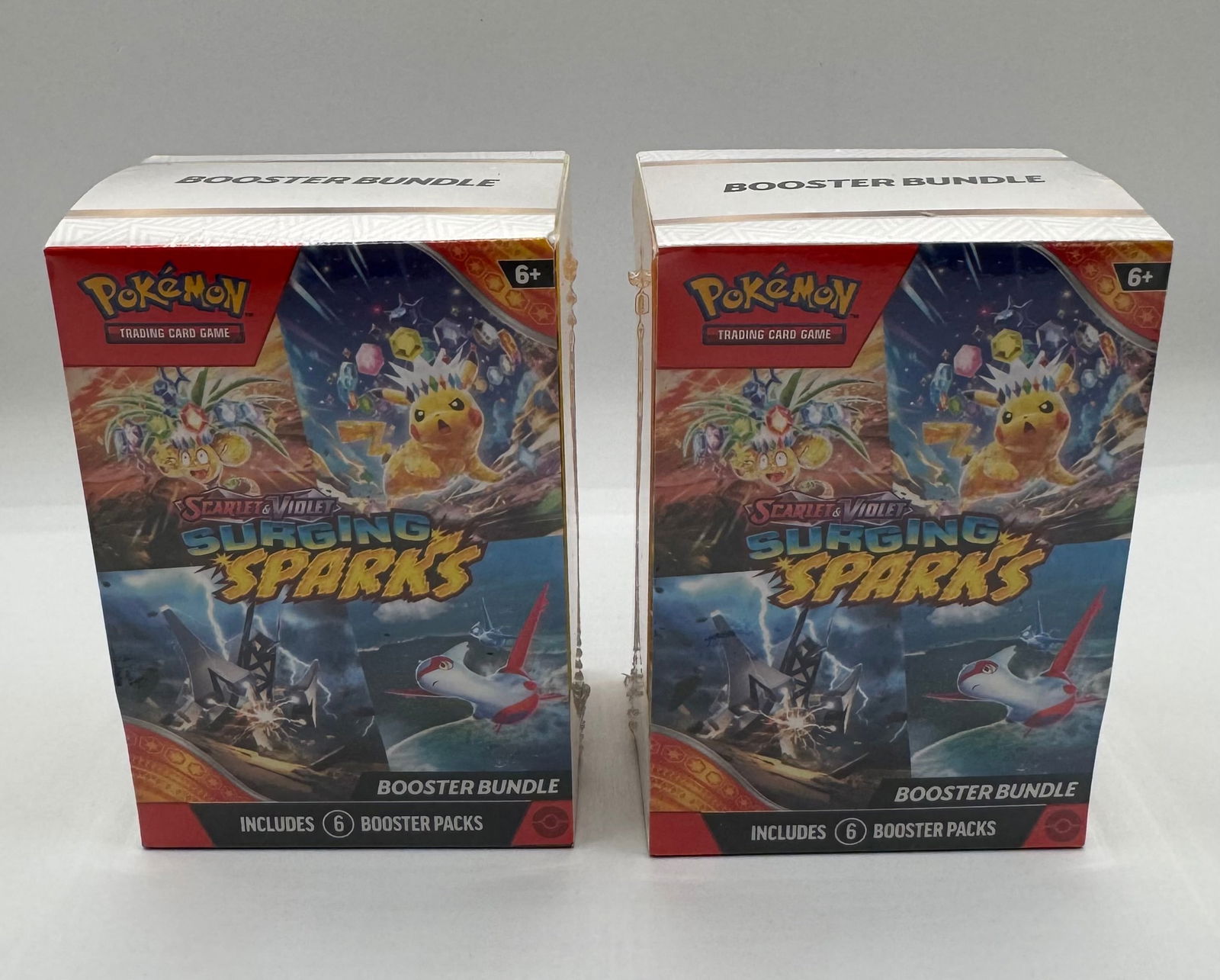 (2) Pokémon TCG: Scarlet & Violet—Surging Sparks Booster Bundles, 12 Packs Total: Series: Scarlet & Violet Expansion: Surging Sparks Quantity: 2 Sealed Booster Bundles Pack Count: 6 Booster Packs per bundle (12 total packs) Condition: New / Factory Sealed Details: Features