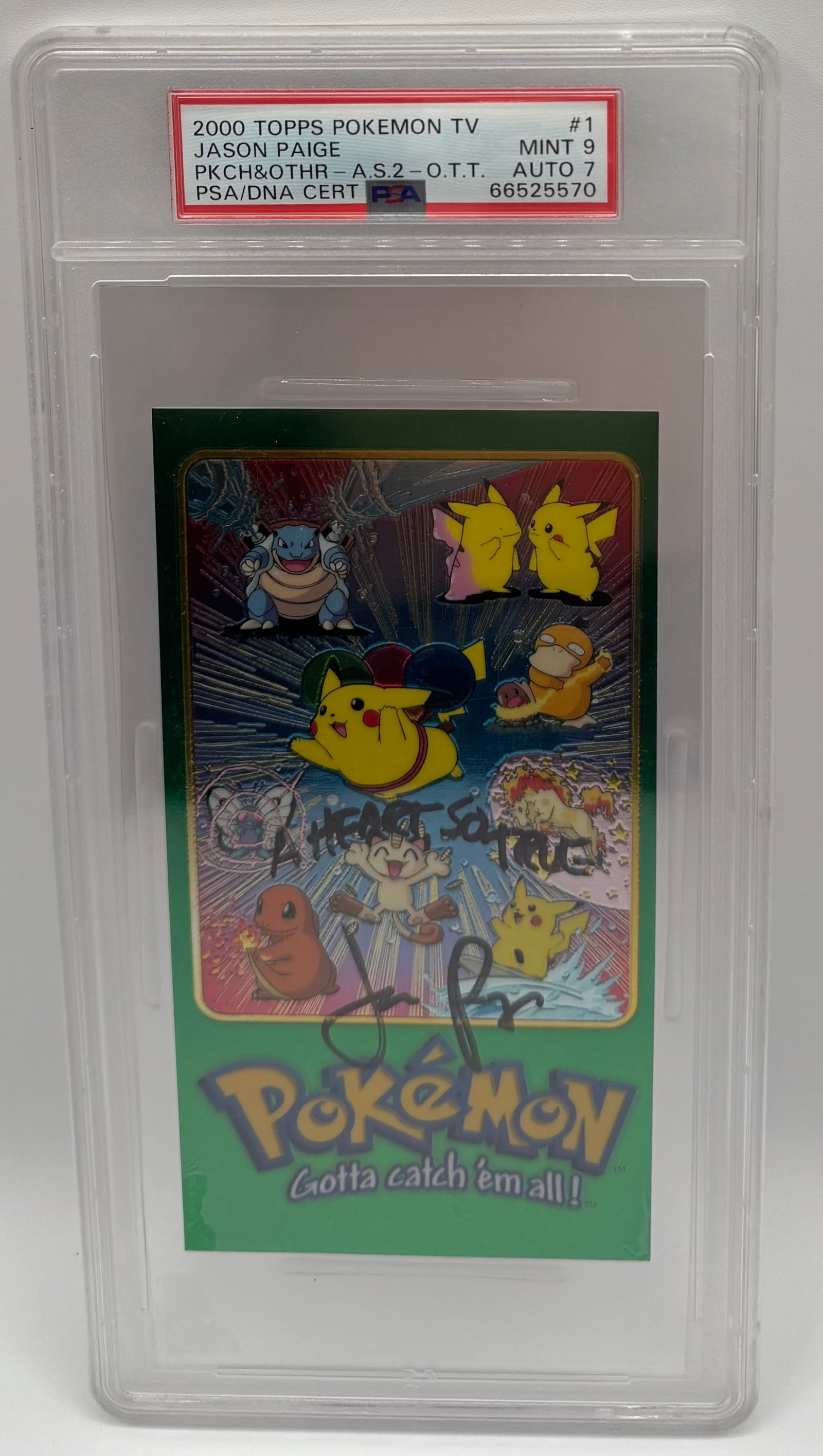2000 Topps Pokémon TV Jason Paige Signed Card PSA 9 / Auto 7: A rare piece of Pokémon history. This Topps Pokémon TV card is signed by Jason Paige, the original singer of the Pokémon Theme Song. It includes the inscription "A HEART SO TRUE." The