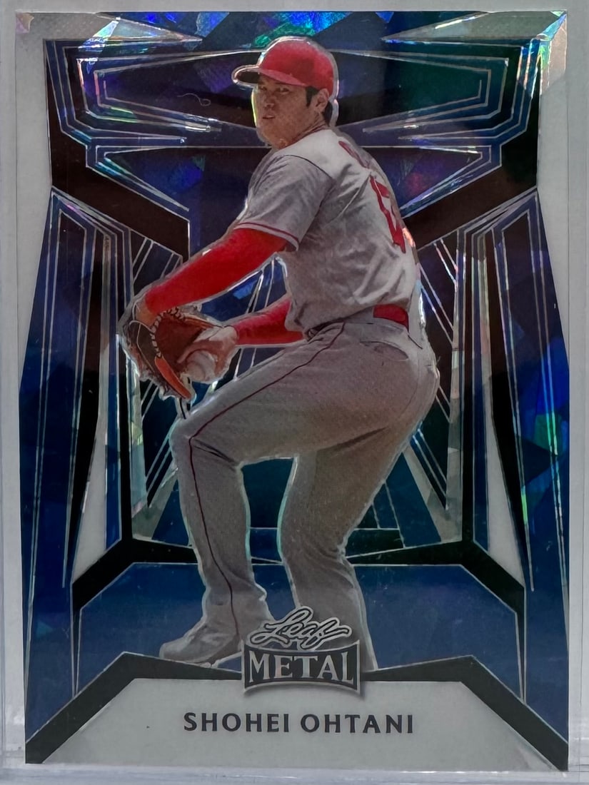 Shohei Ohtani Leaf Metal "Blue Crystal" Parallel /7: A Leaf Metal series card featuring Ohtani in a pitching motion with a vibrant blue "Crystal" or "Atomic" geometric background pattern. Un-slabbed/Top-loaded. 