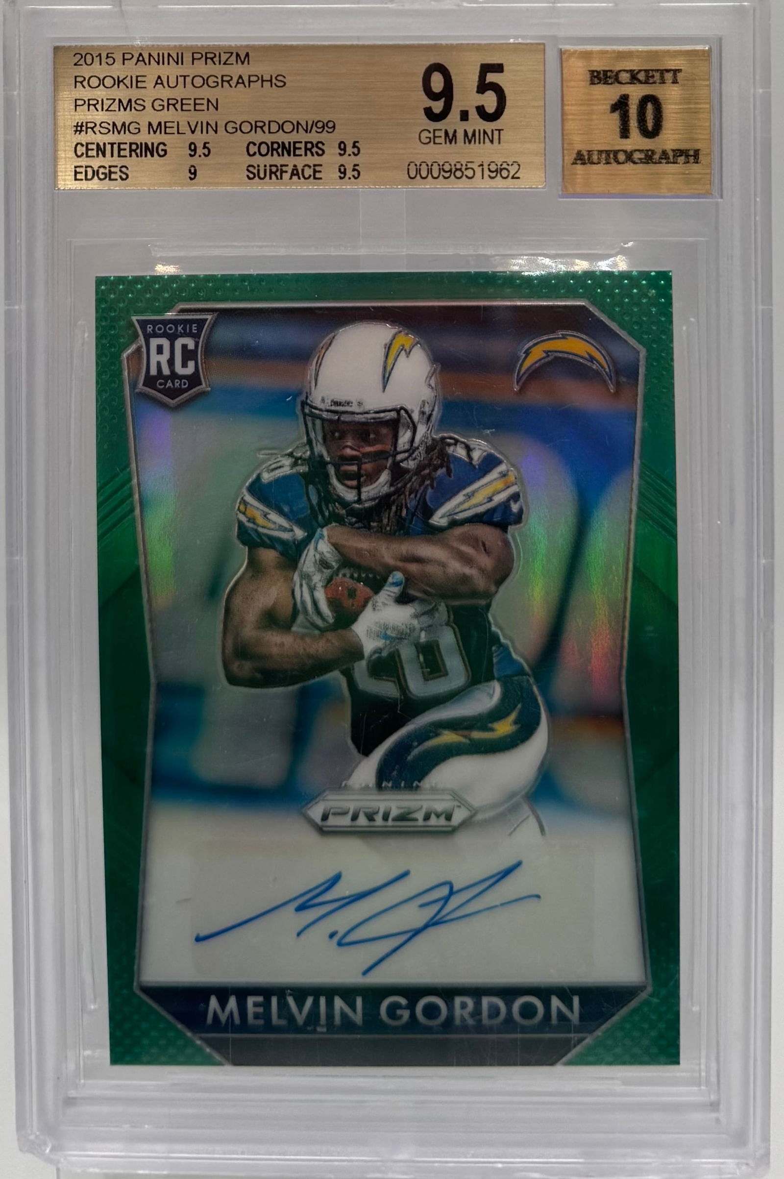 2015 Panini Prizm Melvin Gordon III Green Prizm Rookie Auto #/99 - BGS 9.5 w/ 10 Auto: 2015 Panini Prizm Melvin Gordon III Green Prizm Rookie Auto #/99 - BGS 9.5 w/ 10 Auto Description: A top-tier rookie card for the former Chargers star. This Green Prizm parallel is serial numbered