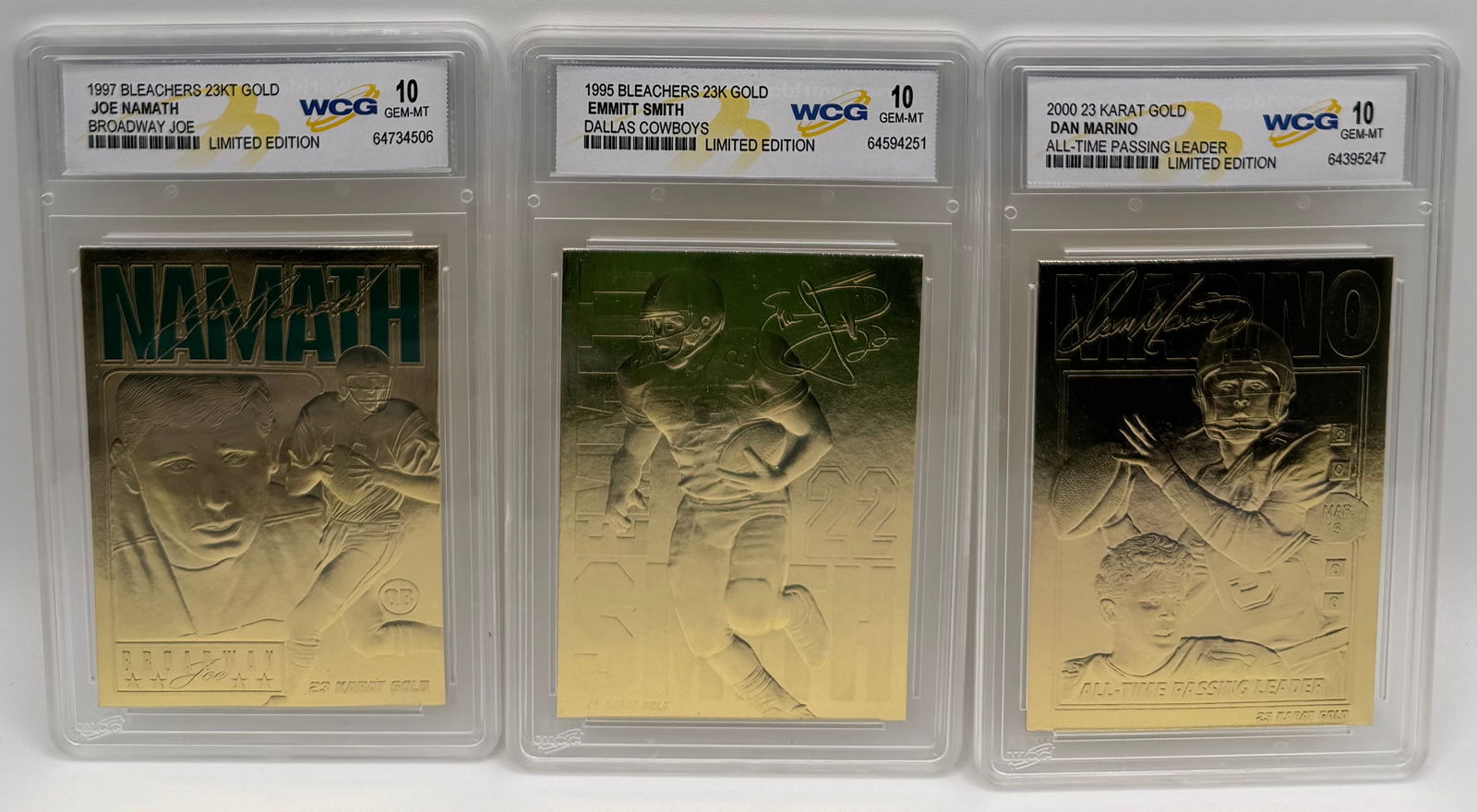 Lot of (3) NFL Legends 23KT Gold Foil Cards - Namath, Smith, Marino: Lot of (3) NFL Legends 23KT Gold Foil Cards - Namath, Smith, Marino - WCG 10 Description: High-luster lot featuring three of the greatest names in NFL history. Each card is struck in 23KT Gold Foil an