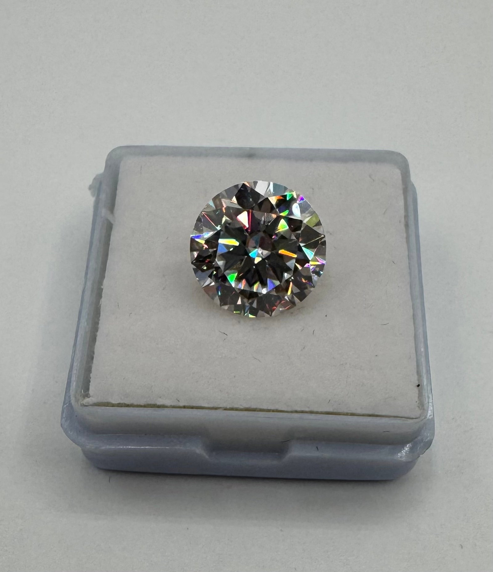 5.00 CT Round Brilliant Cut Moissanite - GRA Certified - VVS1 D Color: A magnificent 5.00 Carat Round Brilliant Cut Moissanite gemstone, presenting exceptional fire and scintillation. This loose stone is GRA Certified and represents the highest industry standards for