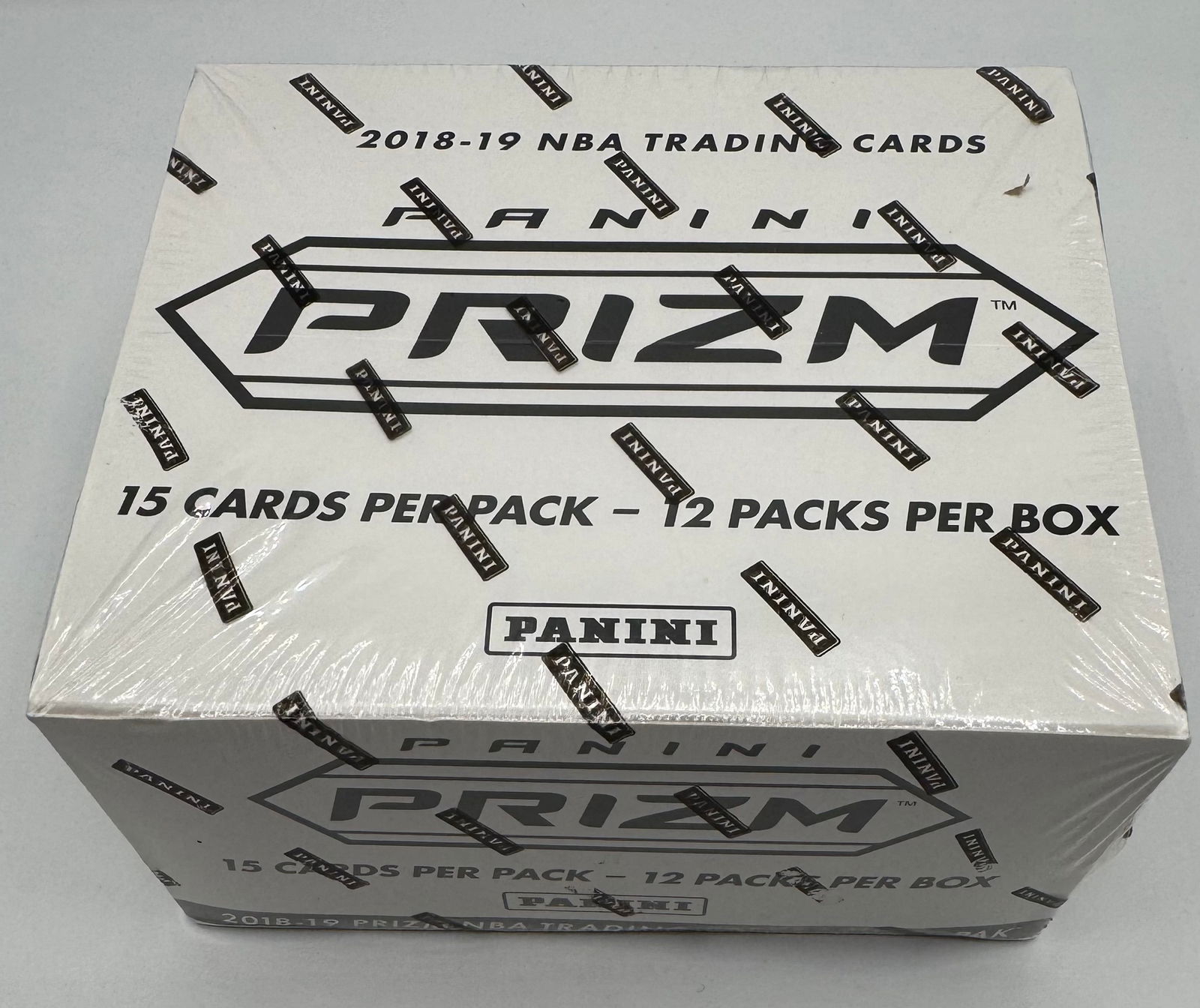 2018-19 Panini Prizm NBA Basketball Factory Sealed Box - 12 Packs: Factory sealed box of 2018-19 Panini Prizm NBA Trading Cards. Configuration: 12 packs per box, 15 cards per pack. This is a premier year for Prizm basketball, highly sought after by collectors for