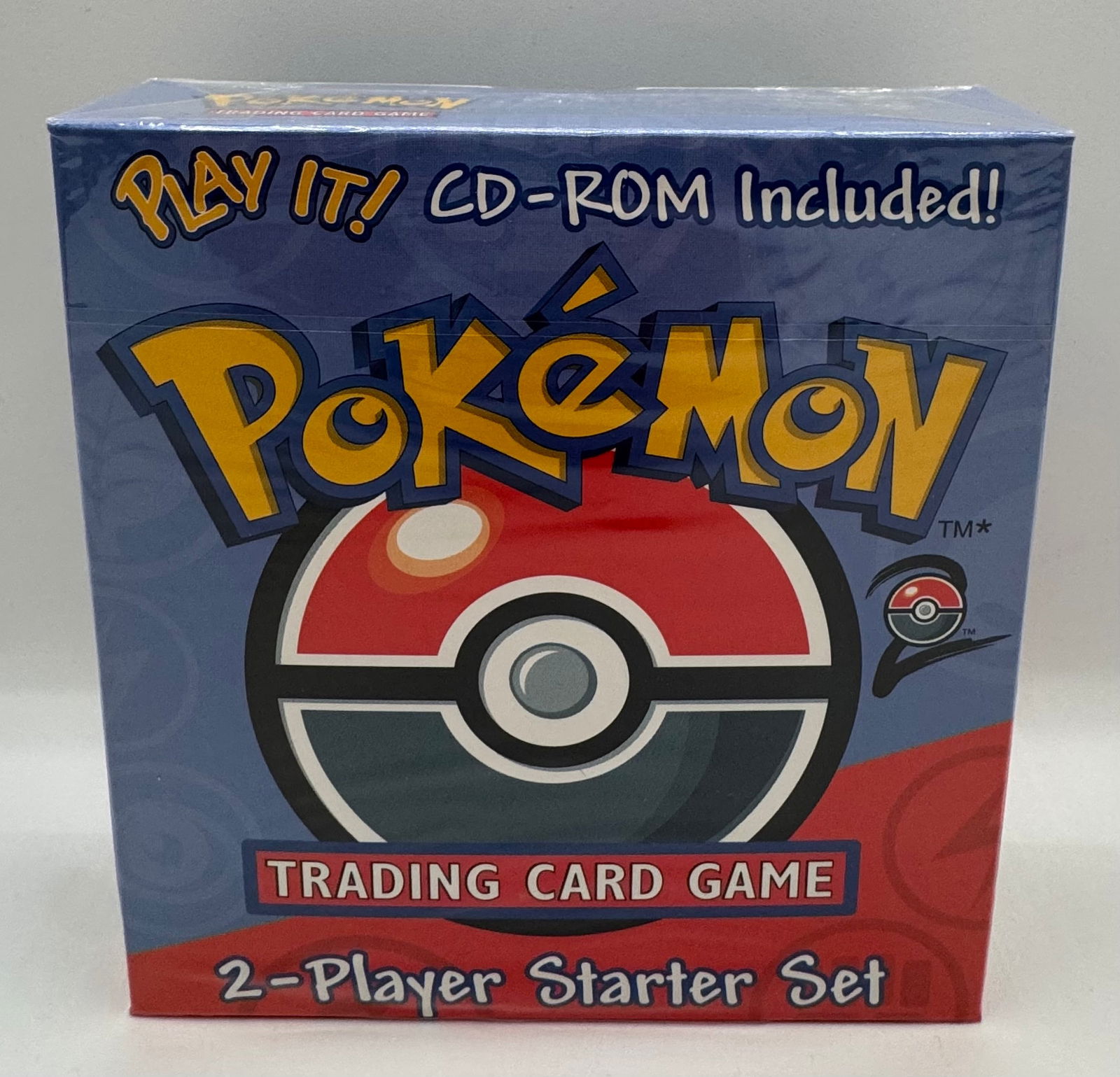 Pokémon TCG: 2-Player Starter Set with Bonus Play It CD-ROM - Sealed: Classic Pokémon Trading Card Game 2-Player Starter Set. This specific version includes the "Play It!" CD-ROM for PC. Box features the classic Poké Ball design. Factory sealed; a