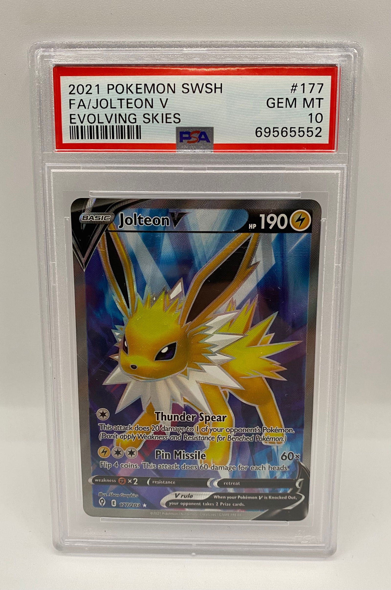 2021 Jolteon V #177 Full Art – PSA 10 Gem Mint (Evolving Skies): A stunning Full Art Jolteon V from the highly sought-after Evolving Skies expansion. This card has been awarded the highest possible grade of PSA 10 Gem Mint. Featuring vibrant colors and a textured