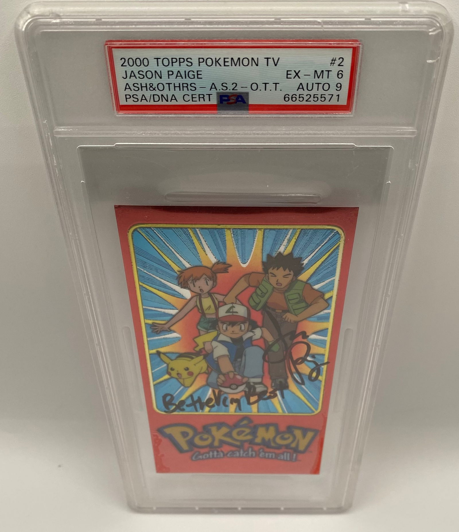 2000 Topps Pokémon TV #2 Ash & Friends Signed by Jason Paige: A rare 2000 Topps Pokémon TV card featuring Ash, Misty, and Brock. This card is hand-signed by Jason Paige, the original singer of the Pokémon theme song, with the inscription "Be the Very