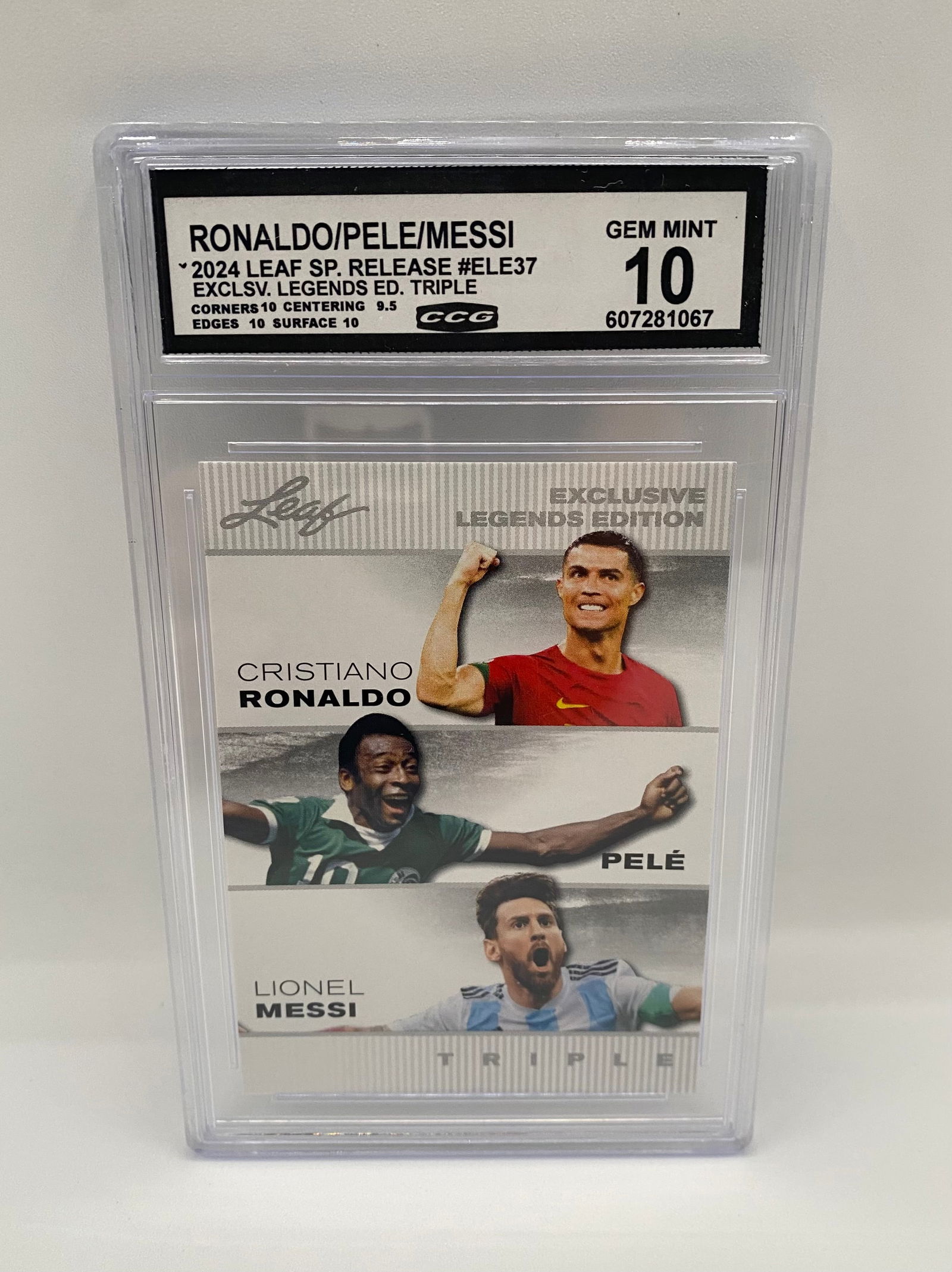 2024 Leaf SP Release Legends Edition Triple Ronaldo/Pelé/Messi – CCG GEM MINT 10: A high-end 2024 Leaf Exclusive Legends Edition card featuring three of the greatest footballers of all time: Cristiano Ronaldo, Pelé, and Lionel Messi. This card is graded a GEM MINT 10 by CCG,