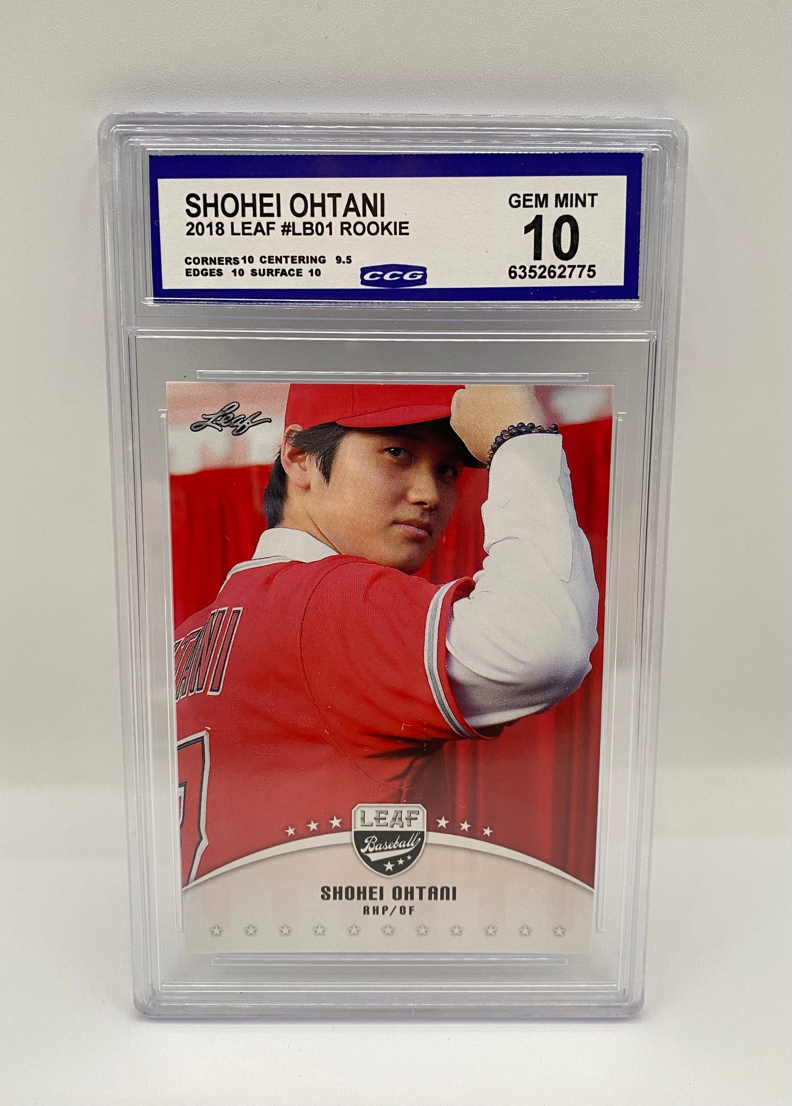 2018 Leaf #LB01 Shohei Ohtani Rookie Card CCG 10 Gem Mint: Essential 2018 Leaf Rookie card (#LB01) for the Ohtani enthusiast. Professionally graded CCG 10 Gem Mint. Subgrades: Corners 10, Edges 10, Surface 10, and Centering 9.5. 