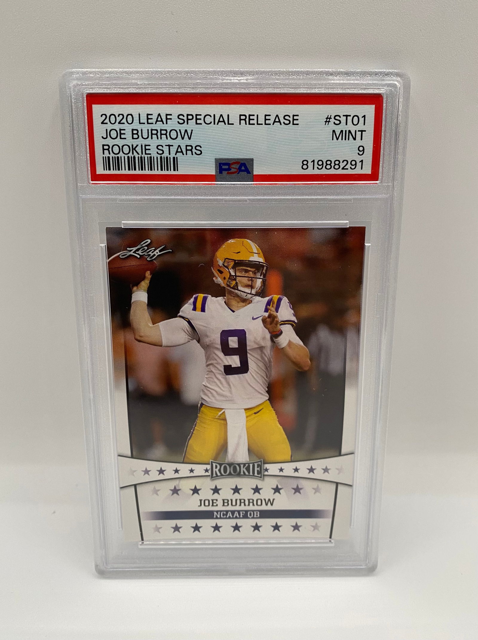 2020 Leaf Special Release Joe Burrow #ST01 Rookie Stars - PSA 9 MINT: A high-grade rookie card featuring Cincinnati Bengals superstar Joe Burrow in his LSU Tigers uniform. Graded MINT 9 by PSA. A must-have for Burrow collectors and modern football investors. 