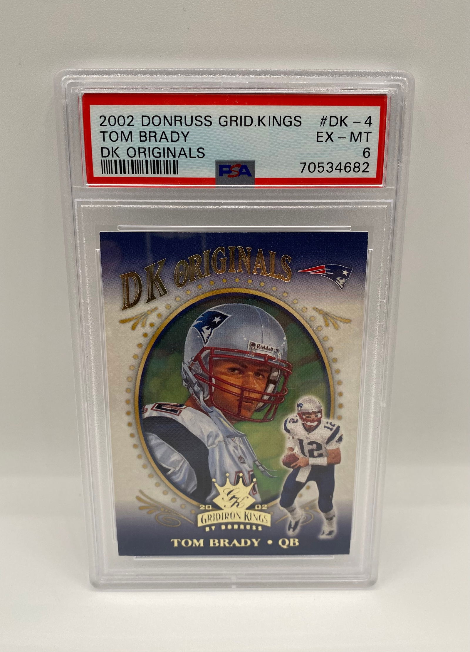 2002 Donruss Gridiron Kings Tom Brady DK Originals #DK-4 - PSA 6: An early-career Tom Brady insert from the iconic Gridiron Kings set. This "DK Originals" card captures the 7-time Super Bowl champion in his classic Patriots uniform. Graded EX-MT 6 by PSA. 