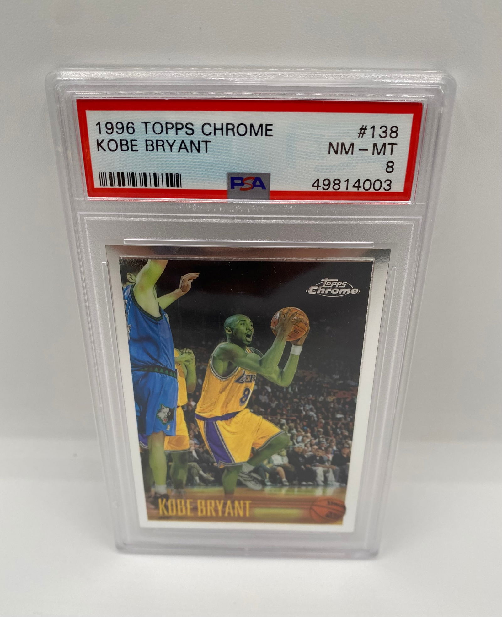 1996 Topps Chrome Kobe Bryant Rookie #138 PSA 8 NM-MT: Up for auction is one of the most iconic basketball cards of the modern era: the 1996 Topps Chrome Kobe Bryant Rookie Card (#138). This cornerstone of the "Black Mamba's" legacy is professionally grad