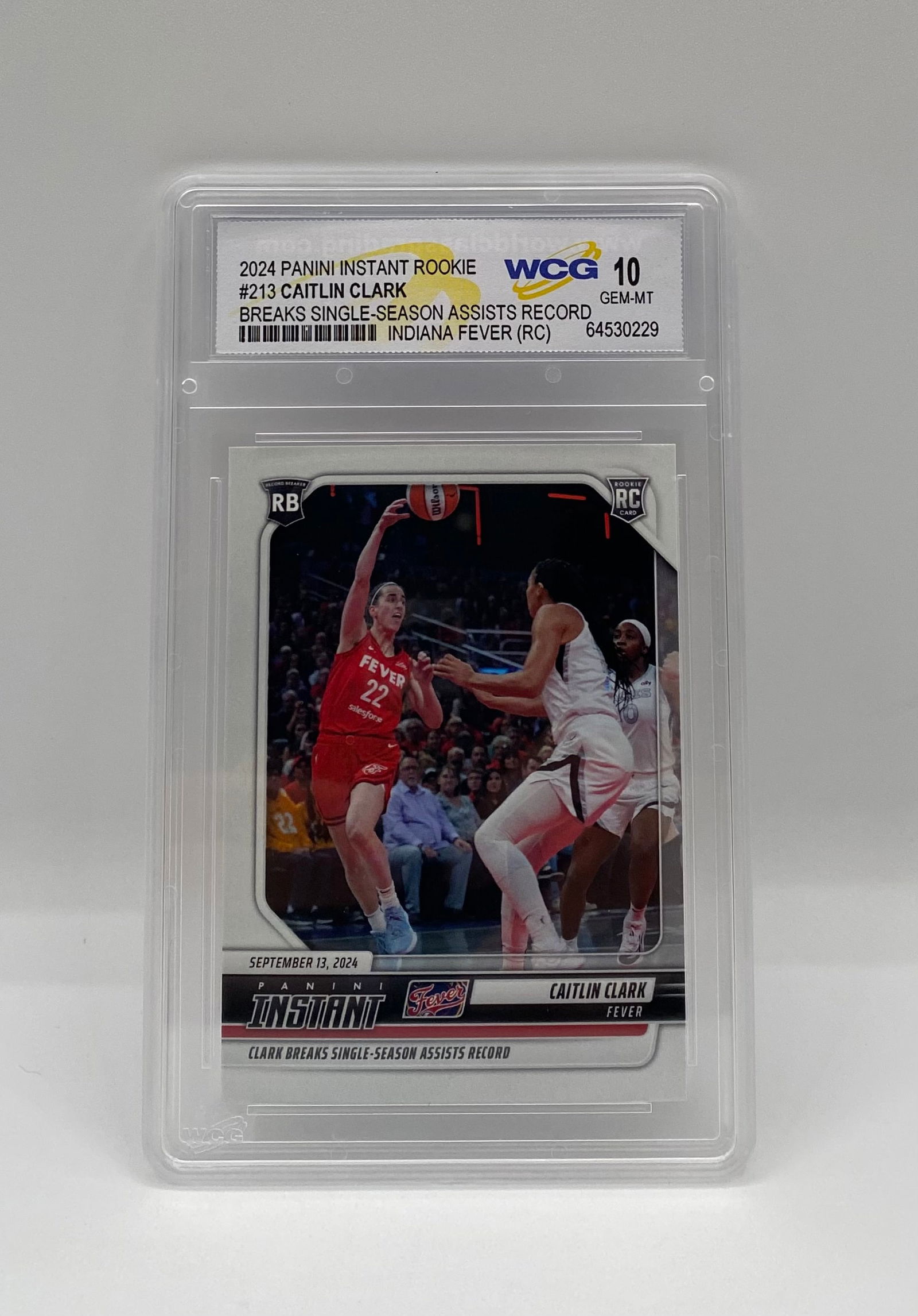 2024 Panini Instant Caitlin Clark Rookie #213 WCG 10 Gem Mint - Season Assist Record: Player: Caitlin Clark • Year/Set: 2024 Panini Instant Rookie • Card #: 213 • Special Feature: Breaks Single-Season Assists Record (September 13, 2024). • Grade: WCG 10 Gem