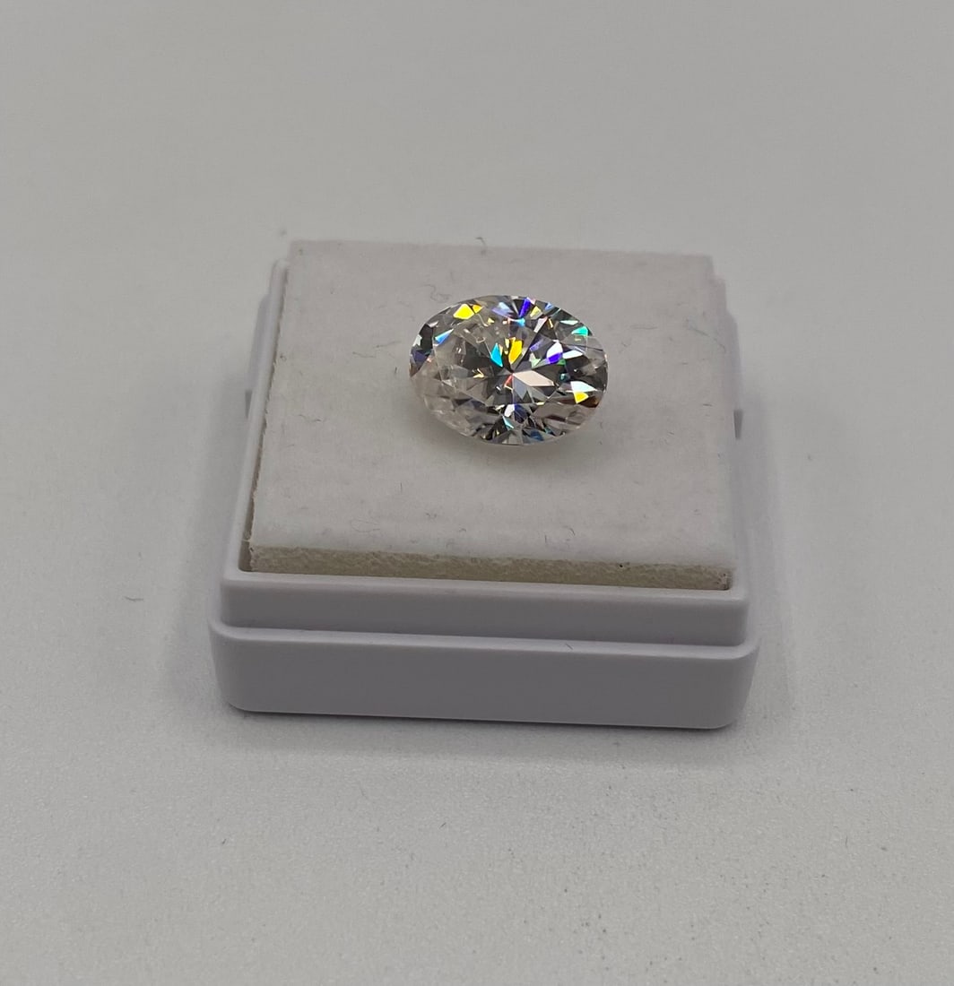 4 Carat Oval Brilliant Moissanite - GRA Certified - Diamond Tester Positive: Carat Weight: 4.00 cts • Shape: Oval Brilliant • Authenticity: GRA Certified (Certificate Included) • Testing: Professionally tested; passes as positive on standard thermal