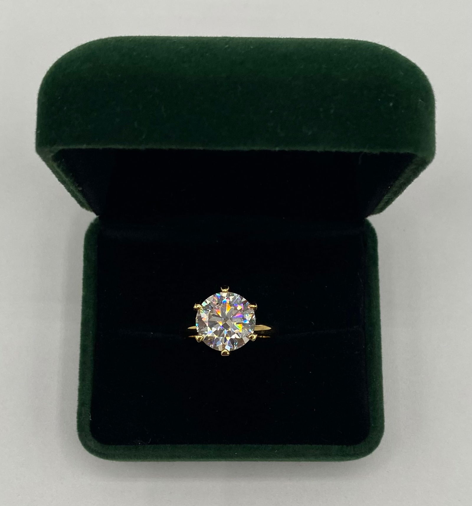 10.00 Carat Round Brilliant Cut Moissanite Ring - GRA Certified - 18k Yellow Gold over Silver: Stone Type: Genuine GRA Certified Moissanite • Carat Weight: 10.00 Carats • Cut: Round Brilliant Cut • Metal: 18k Yellow Gold Plated over Solid .925 Sterling Silver •