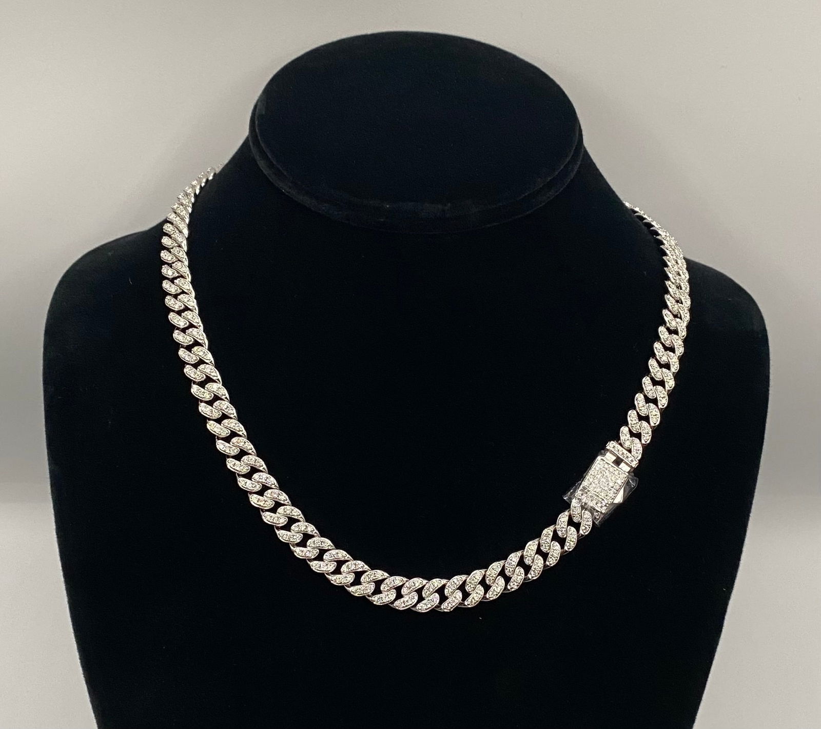 GRA Certified Moissanite 18 Cuban Link Necklace Passes Diamond Tester: Up for auction is a stunning 18-inch Cuban link necklace featuring high-quality Moissanite stones. Each stone has been verified to pass a professional diamond tester, offering the brilliance and fire