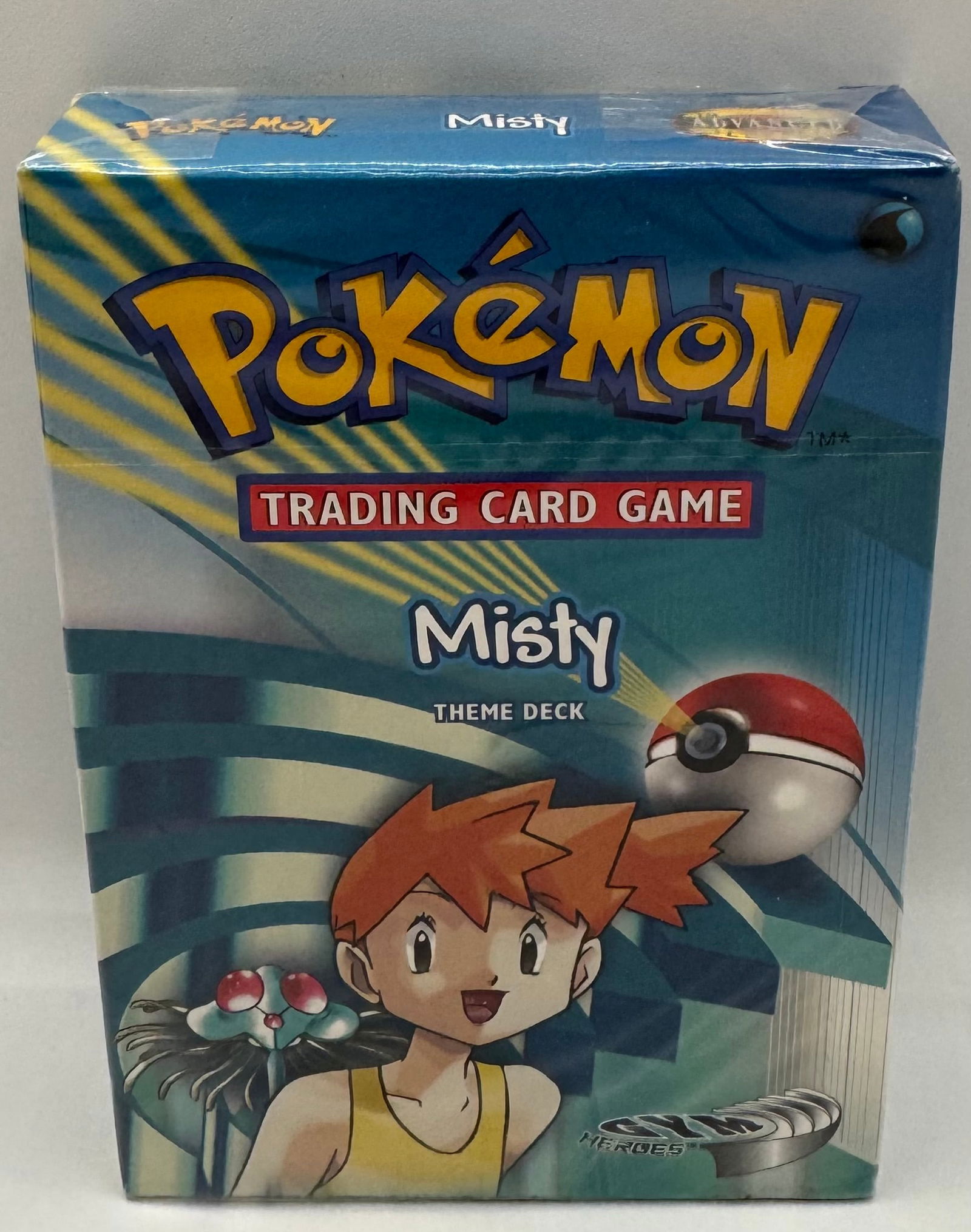 2000 Pokemon Gym Heroes Misty Theme Deck Factory Sealed WOTC: Up for auction is a rare, original factory-sealed Pokémon Trading Card Game theme deck from the iconic Gym Heroes expansion, released by Wizards of the Coast (WOTC) in August 2000. This "Misty"
