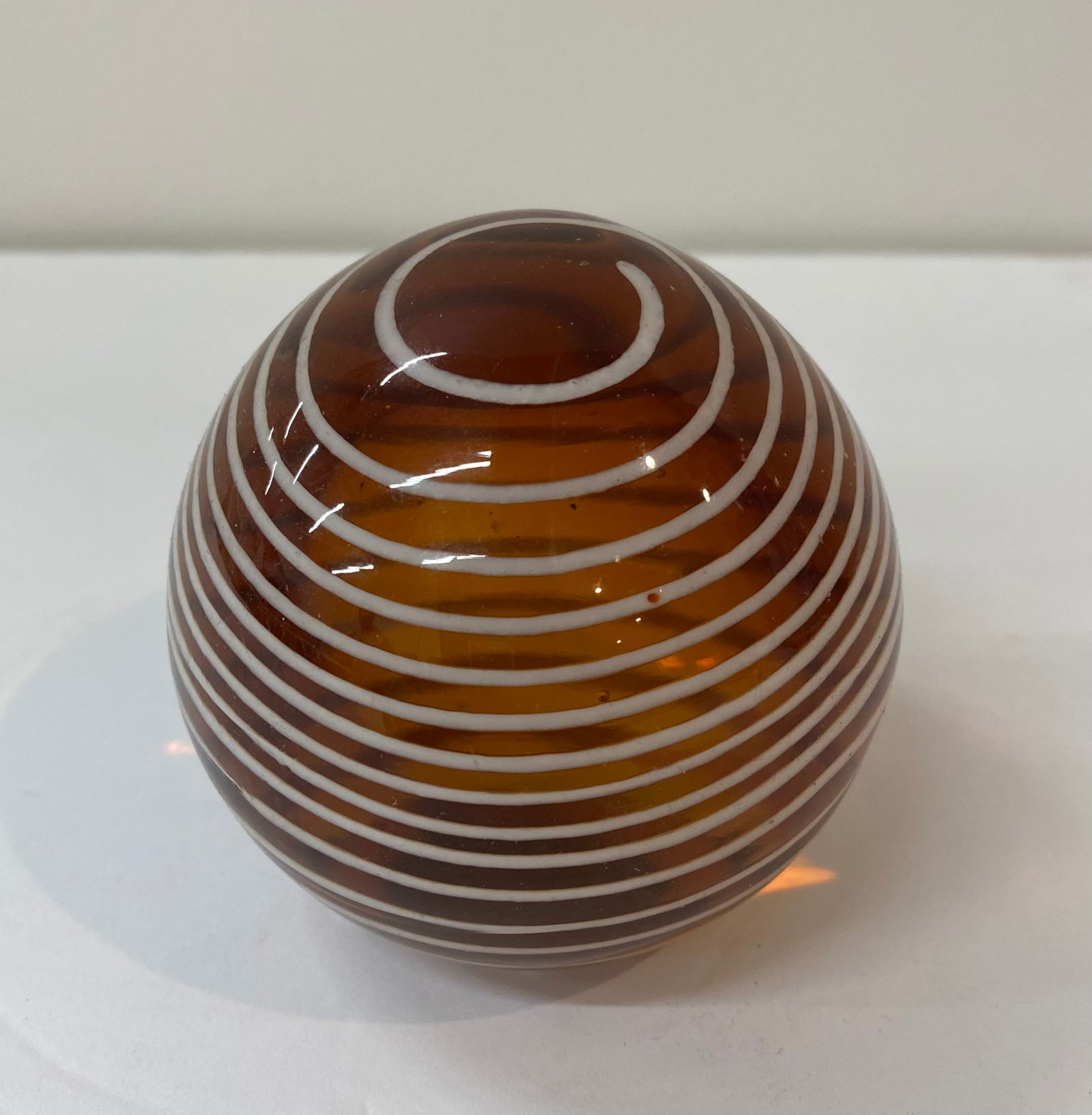 Amber Art Glass Paperweight with White Latticino Spiral (1 of 1)