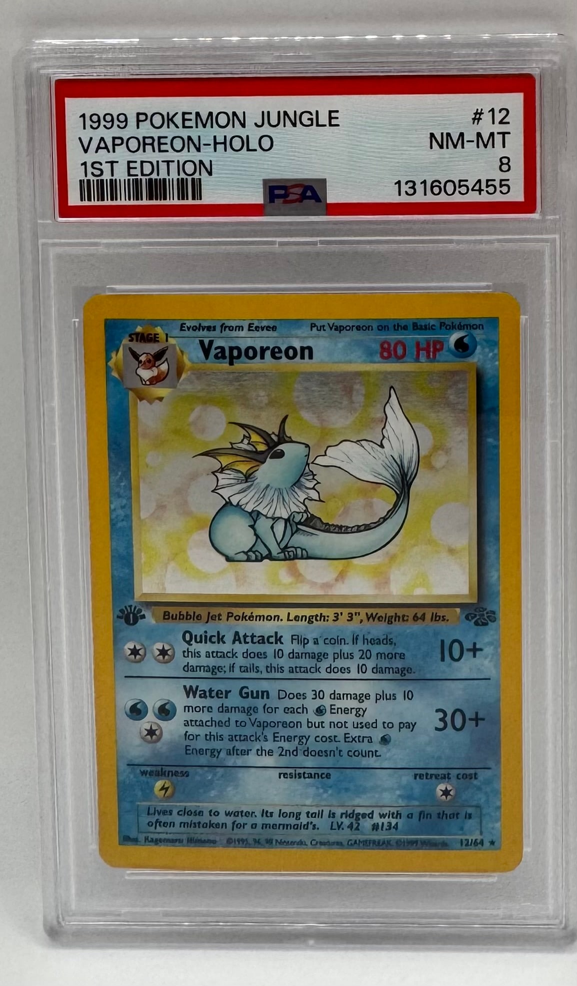 1999 Pokémon Jungle Vaporeon Holo 1st Edition: A stunning high-grade 1st Edition holographic Vaporeon. This "Eeveelution" is one of the most popular chase cards from the Jungle set. • Grade: PSA 8 (Near Mint-Mint) • Cert Number:
