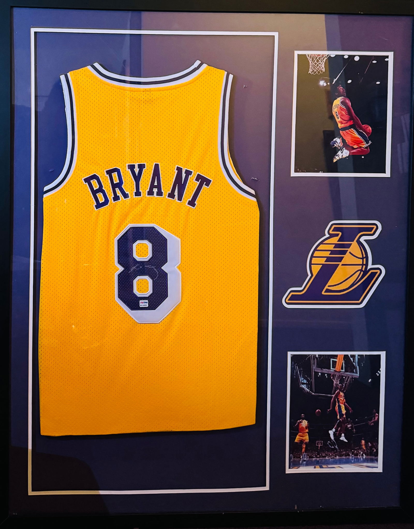 Kobe Bryant Autographed Los Angeles Lakers Jersey - PSA/DNA: Celebrate the legacy of "The Black Mamba" with this premium, custom-framed Los Angeles Lakers jersey. This piece features an authentic signature from NBA legend Kobe Bryant on his iconic #8 jersey,