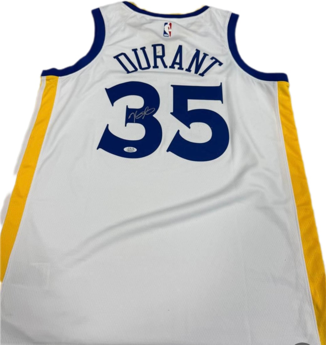 Kevin Durant Autographed Golden State Warriors Jersey – JSA Authenticated: Up for auction is a hand-signed Golden State Warriors jersey by 2-time NBA Finals MVP and future Hall of Famer, Kevin Durant. This jersey represents Durant’s historic tenure with the Warriors,